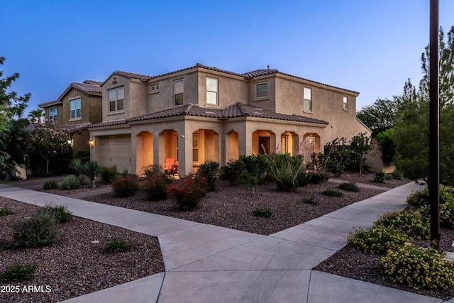 5016 S Curie Way, Mesa, AZ 85212 - mediterranean / spanish-style house with a garage, stucco siding, and a tile roof