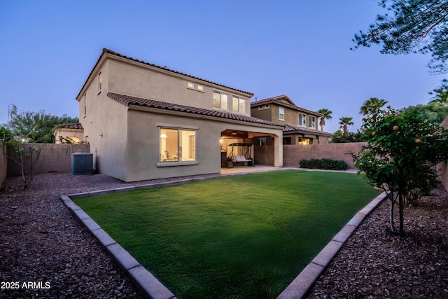 5016 S Curie Way, Mesa, AZ 85212 - rear view of house featuring stucco siding, a fenced backyard, a patio, and a tiled roof