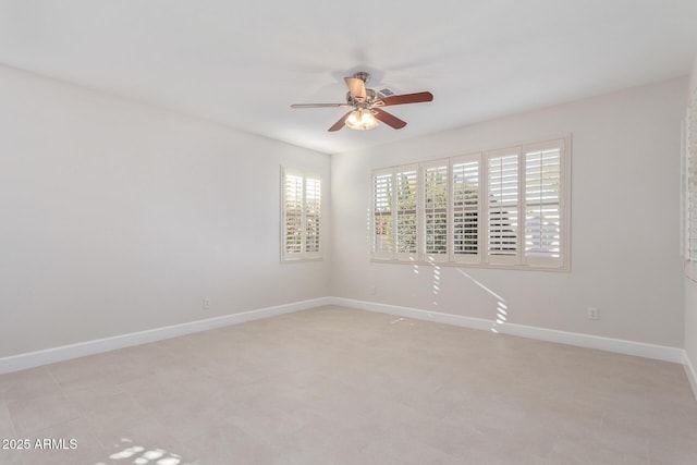 unfurnished room featuring ceiling fan