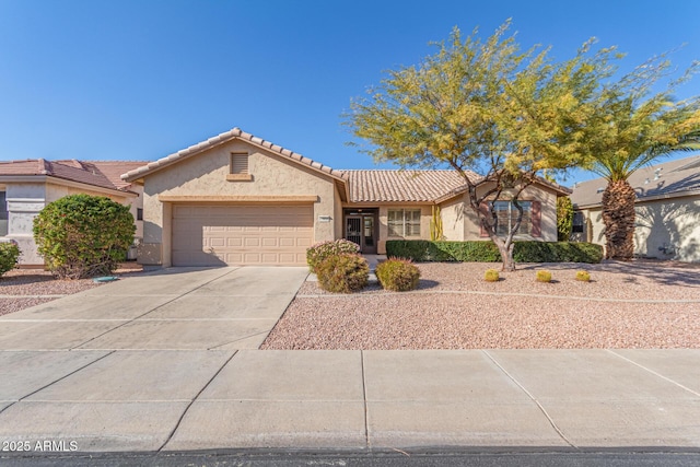 single story home with a garage