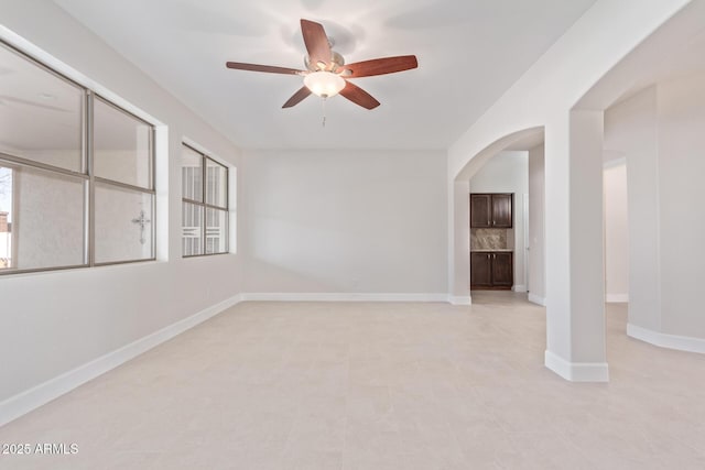 empty room featuring ceiling fan