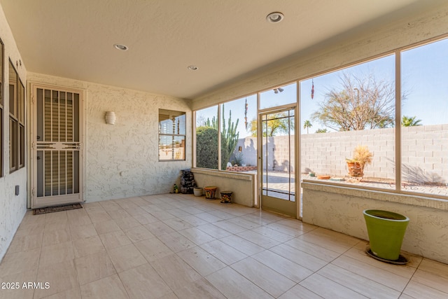 view of unfurnished sunroom