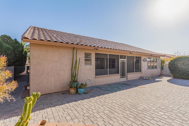 back of house featuring a patio area