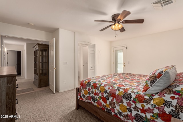 bedroom with ceiling fan and light colored carpet