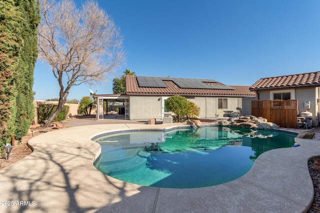 view of pool featuring a patio area