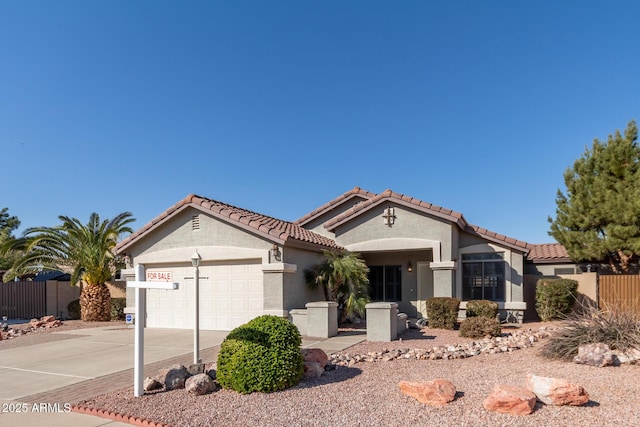 view of front of property featuring a garage