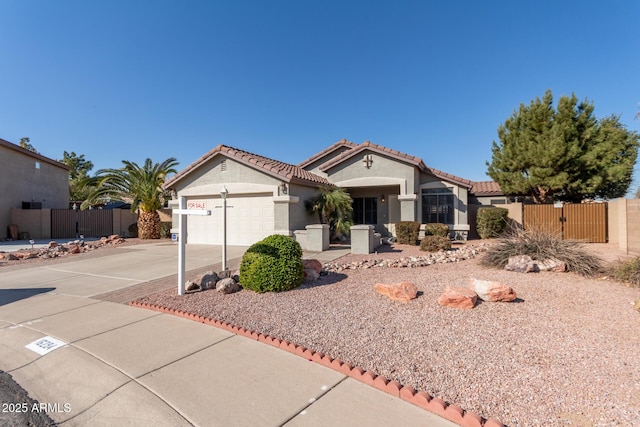 view of front of property featuring a garage