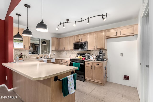 6908 W Sunnyside Dr, Peoria, AZ 85345 - kitchen featuring stainless steel appliances, light brown cabinets, and decorative backsplash