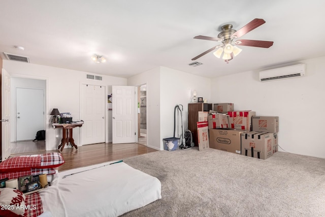 6908 W Sunnyside Dr, Peoria, AZ 85345 - bedroom with a wall mounted air conditioner and ceiling fan