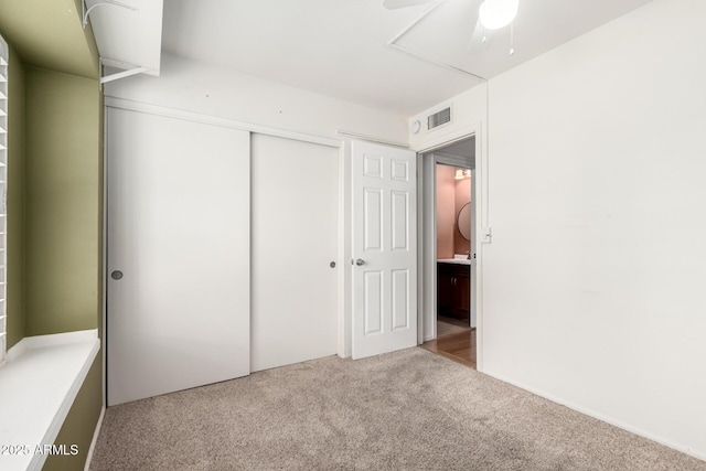6908 W Sunnyside Dr, Peoria, AZ 85345 - unfurnished bedroom featuring carpet flooring and a closet