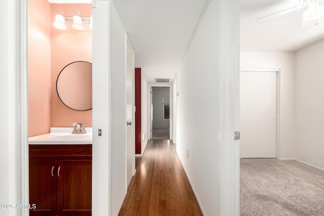 6908 W Sunnyside Dr, Peoria, AZ 85345 - corridor with a sink