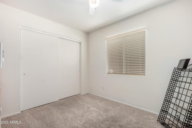 6908 W Sunnyside Dr, Peoria, AZ 85345 - unfurnished bedroom featuring carpet, a closet, ceiling fan, and baseboards