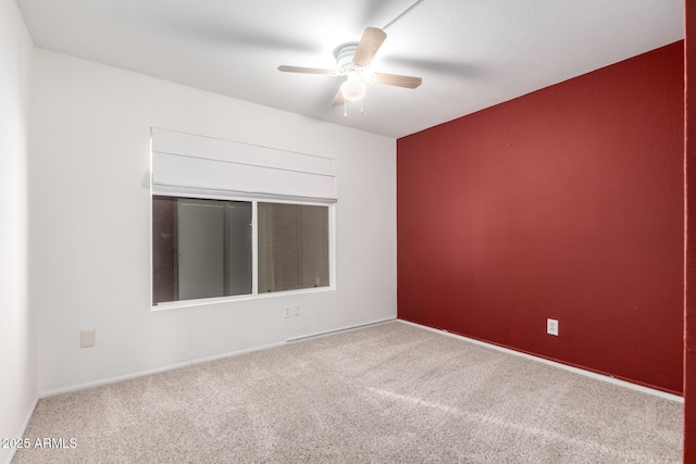 6908 W Sunnyside Dr, Peoria, AZ 85345 - empty room with carpet floors, a ceiling fan, and baseboards