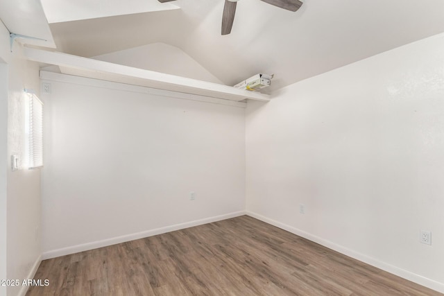 6908 W Sunnyside Dr, Peoria, AZ 85345 - unfurnished room with ceiling fan, wood finished floors, lofted ceiling, and baseboards
