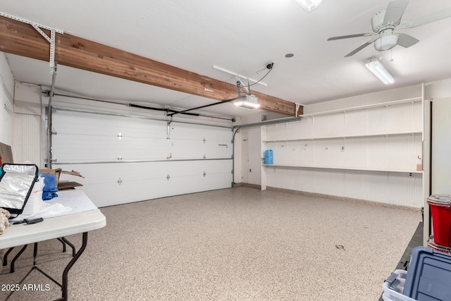 6908 W Sunnyside Dr, Peoria, AZ 85345 - garage with a garage door opener, ceiling fan, and baseboards