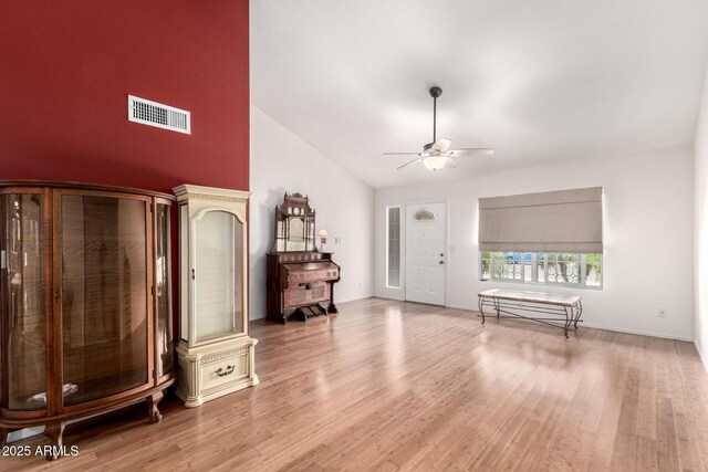 6908 W Sunnyside Dr, Peoria, AZ 85345 - entryway featuring a ceiling fan, lofted ceiling, and wood finished floors