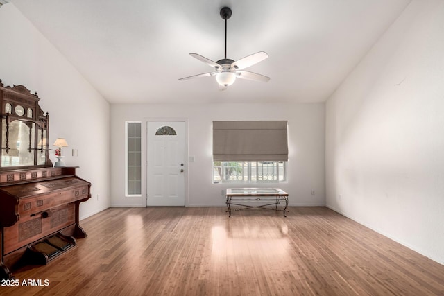 6908 W Sunnyside Dr, Peoria, AZ 85345 - foyer featuring ceiling fan, wood finished floors, and baseboards
