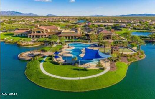 bird's eye view with a water and mountain view