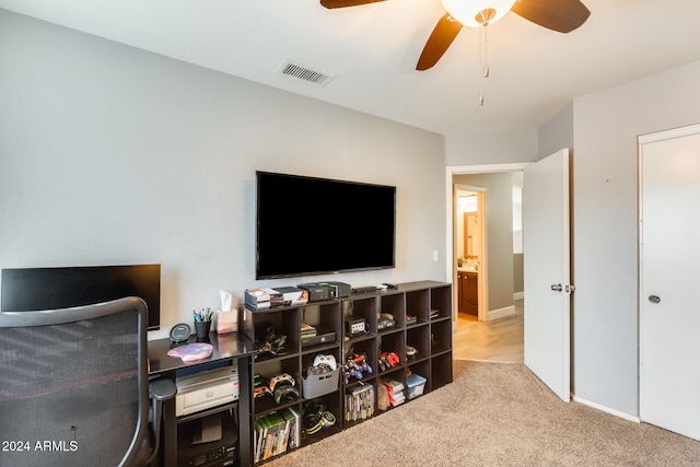 carpeted bedroom featuring ceiling fan