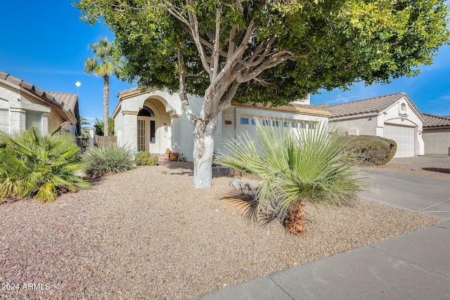 view of front of property featuring a garage