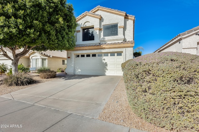 view of front of property featuring a garage