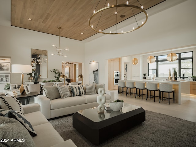 living room featuring a towering ceiling and wooden ceiling