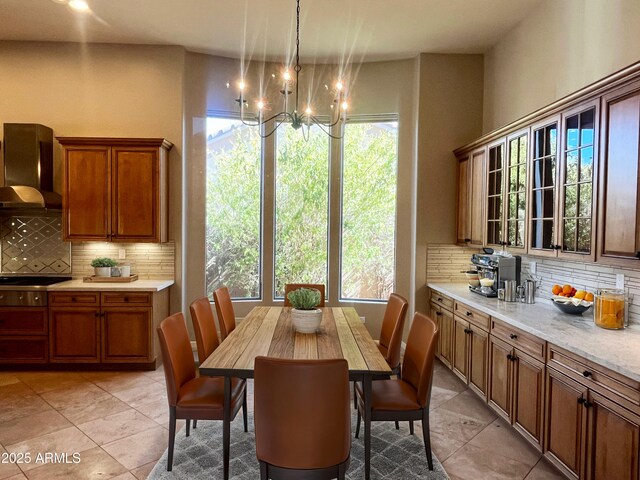 42023 N Bridlewood Way, Anthem, AZ 85086 - dining area with a chandelier and light tile patterned floors