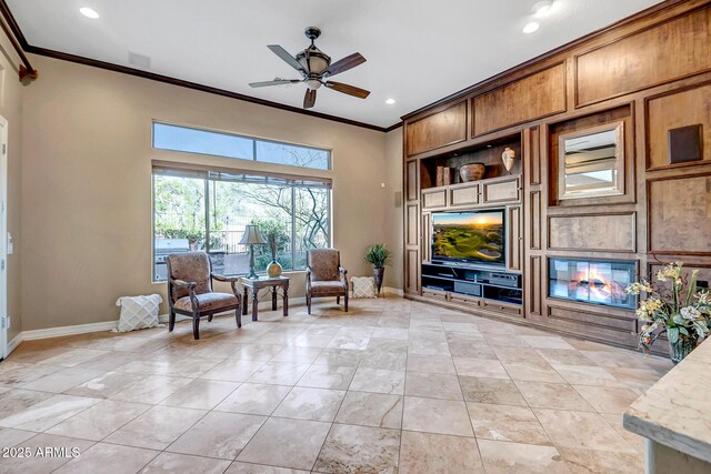42023 N Bridlewood Way, Anthem, AZ 85086 - sitting room with crown molding, ceiling fan, baseboards, light tile patterned flooring, and recessed lighting