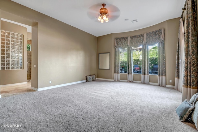 42023 N Bridlewood Way, Anthem, AZ 85086 - carpeted spare room with a ceiling fan and baseboards