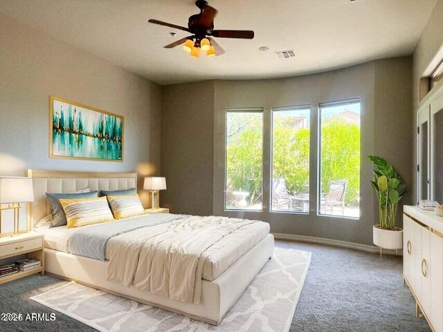 42023 N Bridlewood Way, Anthem, AZ 85086 - carpeted bedroom featuring ceiling fan and baseboards