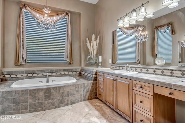 42023 N Bridlewood Way, Anthem, AZ 85086 - bathroom featuring a chandelier, a bath, vanity, and tile patterned flooring