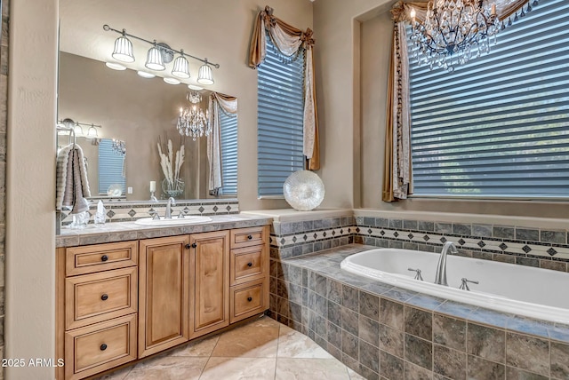 42023 N Bridlewood Way, Anthem, AZ 85086 - full bathroom with a chandelier, a garden tub, vanity, and healthy amount of natural light