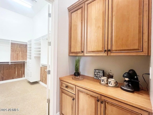 42023 N Bridlewood Way, Anthem, AZ 85086 - bar area featuring light colored carpet and baseboards