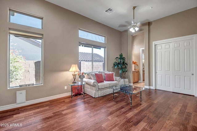 42023 N Bridlewood Way, Anthem, AZ 85086 - living room featuring wood finished floors, baseboards, and ceiling fan
