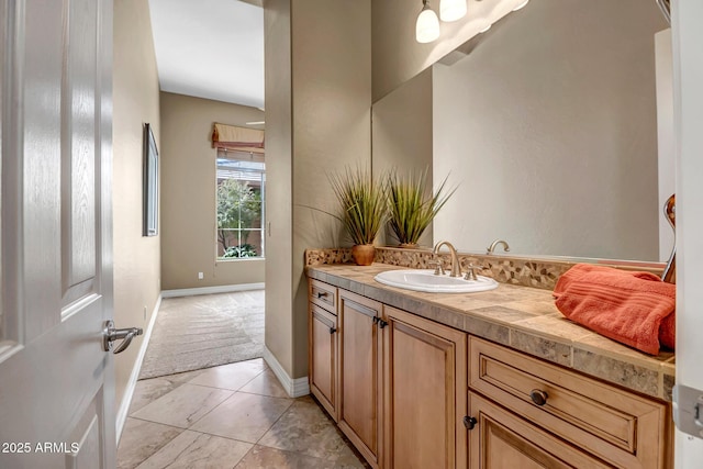 42023 N Bridlewood Way, Anthem, AZ 85086 - bathroom featuring vanity and baseboards