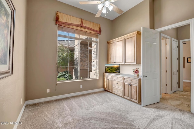 42023 N Bridlewood Way, Anthem, AZ 85086 - spare room featuring light colored carpet, a ceiling fan, and baseboards