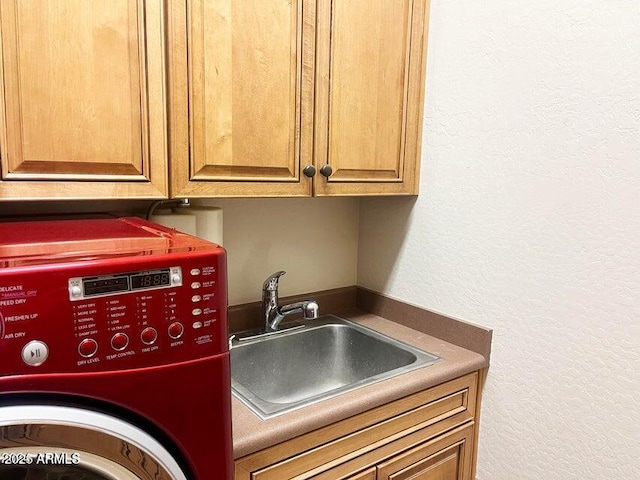42023 N Bridlewood Way, Anthem, AZ 85086 - laundry area with washer / dryer, cabinet space, and a textured wall