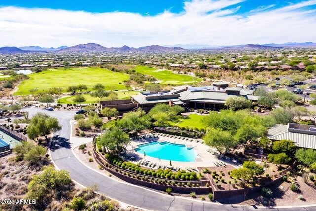 42023 N Bridlewood Way, Anthem, AZ 85086 - bird's eye view of a pool area, a mountainous background, and a golf club