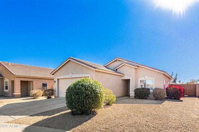 ranch-style house featuring a garage