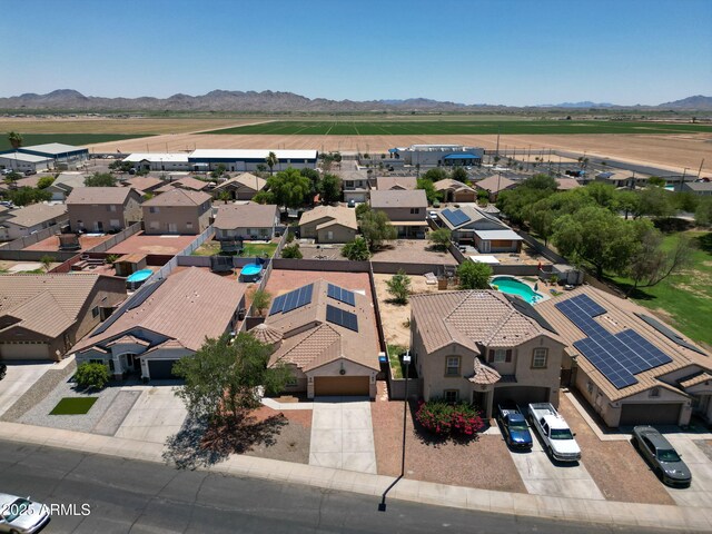 1623 E Maplewood Ave, Buckeye, AZ 85326 - aerial perspective of suburban area featuring a mountain backdrop