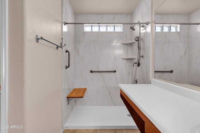 1623 E Maplewood Ave, Buckeye, AZ 85326 - full bath with plenty of natural light, a marble finish shower, and vanity