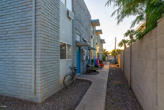 view of property exterior at dusk