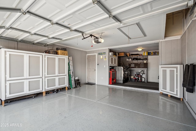 garage featuring a garage door opener