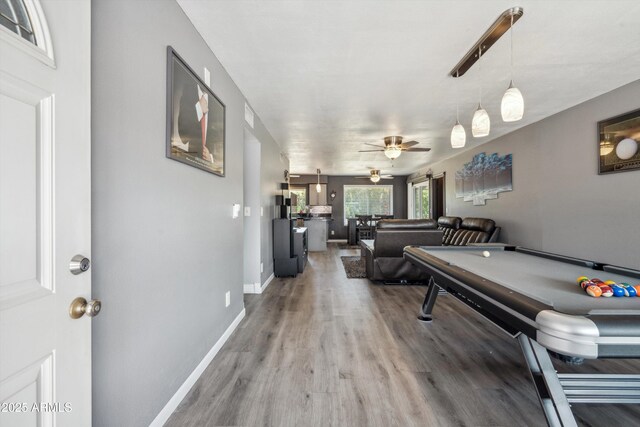 playroom featuring pool table, baseboards, a ceiling fan, and wood finished floors