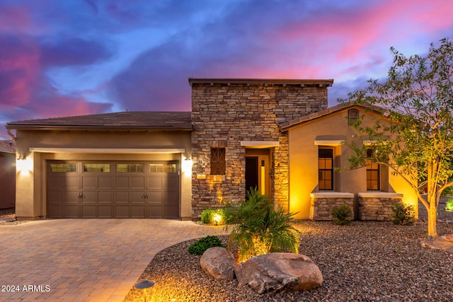 view of front of home featuring a garage