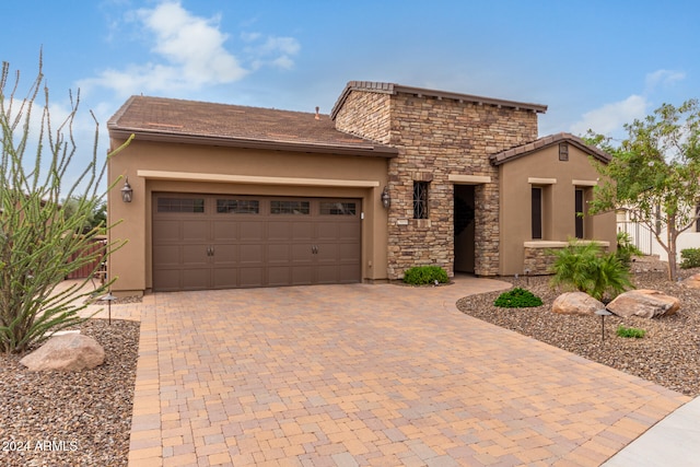 view of front of home with a garage