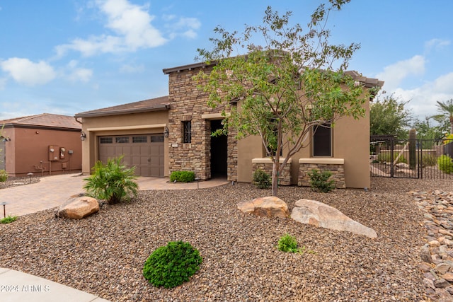 view of front of home with a garage