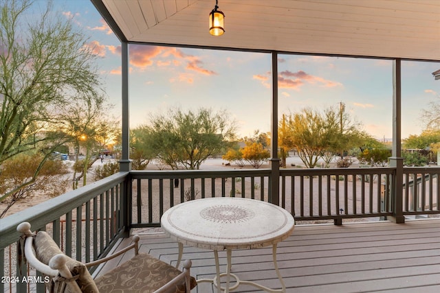 deck at dusk with a water view