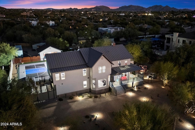 aerial view at dusk with a mountain view