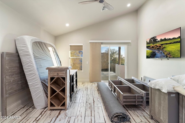 interior space with ceiling fan, light hardwood / wood-style floors, and lofted ceiling